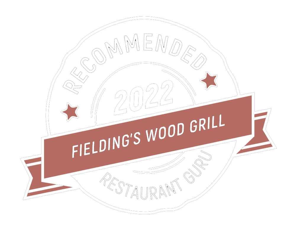 Logo of Fielding's Wood Grill restaurant guru recommendation 